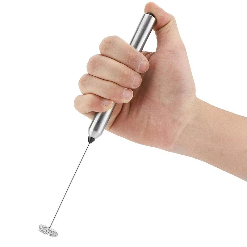 Handheld battery operated milk frother
